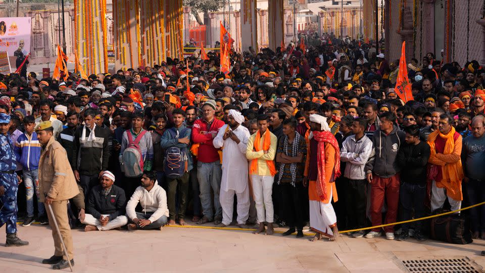 Devotees wait in a long queue to enter the newly opened Lord Ram temple, in Ayodhya, India, Tuesday, January 23, 2024. - Rajesh Kumar Singh/AP