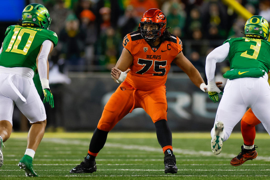 EUGENE, OREGON - NOVEMBER 24: Taliese Fuaga #75 of the Oregon State Beavers blocks during a game against the Oregon Ducks at Autzen Stadium on November 24, 2023 in Eugene, Oregon. (Photo by Brandon Sloter/Image Of Sport/Getty Images)