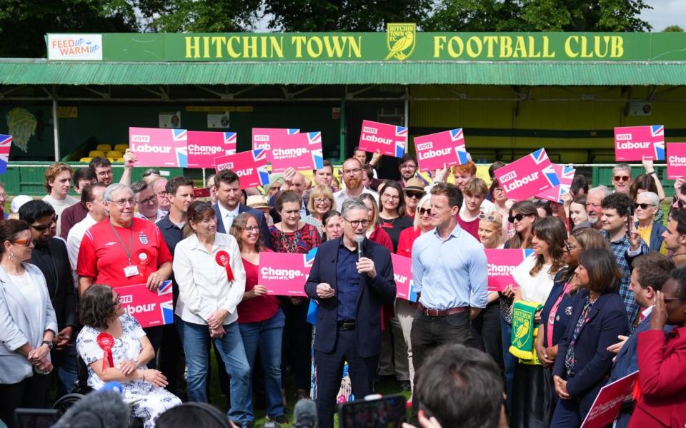 Sir Keir Starmer delivers a stump speech to supporters at Hitchin Town Football Club