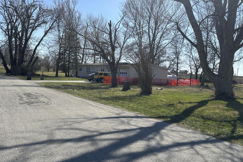 This photo taken on Tuesday, March 19, 2024, shows a house in Zearing, Iowa, where four members of a family were accused of abducting and badly abusing another relative. The 18-year-old victim suffered a brain bleed and other injuries. Court documents say the teen weighed just 70 pounds (32 kilograms) when he showed up at a hospital. (AP Photo/Hannah Fingerhut)