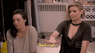 Scheana Shay and Ariana Madix using reverse signals in season six of "Vanderpump Rules"