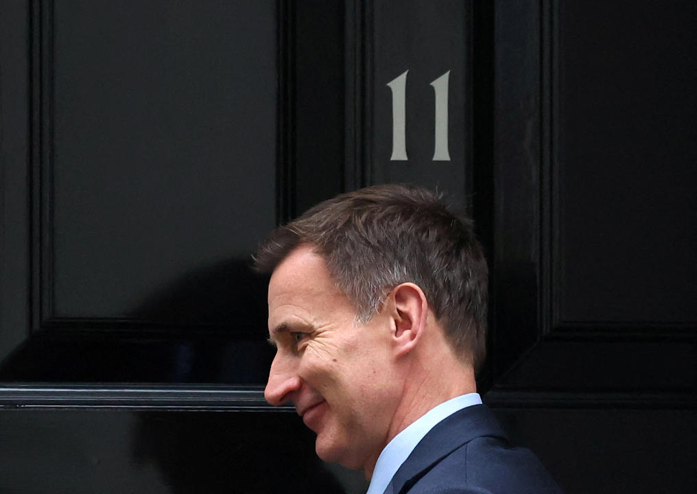 FILE PHOTO: British Finance Minister Jeremy Hunt leaves Downing Street, in London, Britain, March 19, 2024. REUTERS/Toby Melville/File Photo