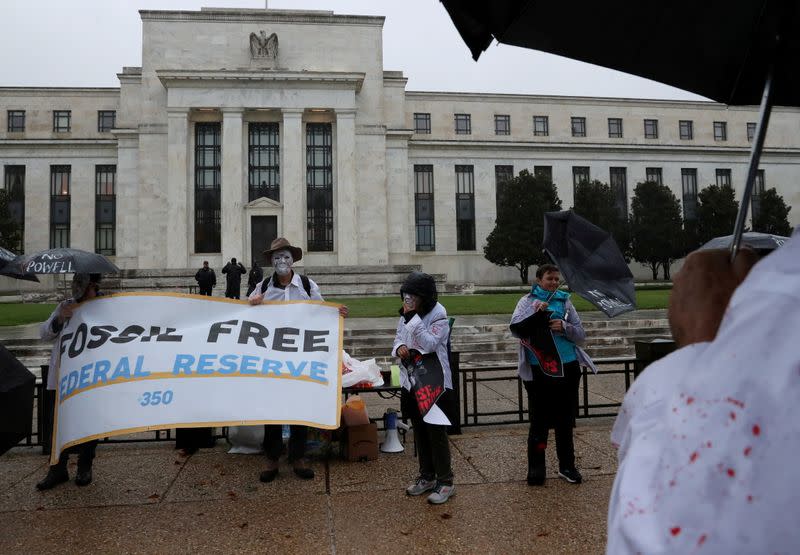 FILE PHOTO: Climate activists protest Jerome Powell in Washington, D.C.