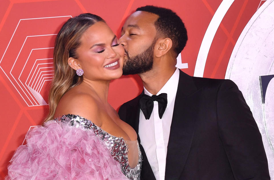 US singer-songwriter John Legend and his wife model Chrissy Teigen attend the 74th Annual Tony Awards at the Winter Garden Theater on September 26, 2021, in New York City. (Photo by ANGELA  WEISS / AFP) (Photo by ANGELA  WEISS/AFP via Getty Images)