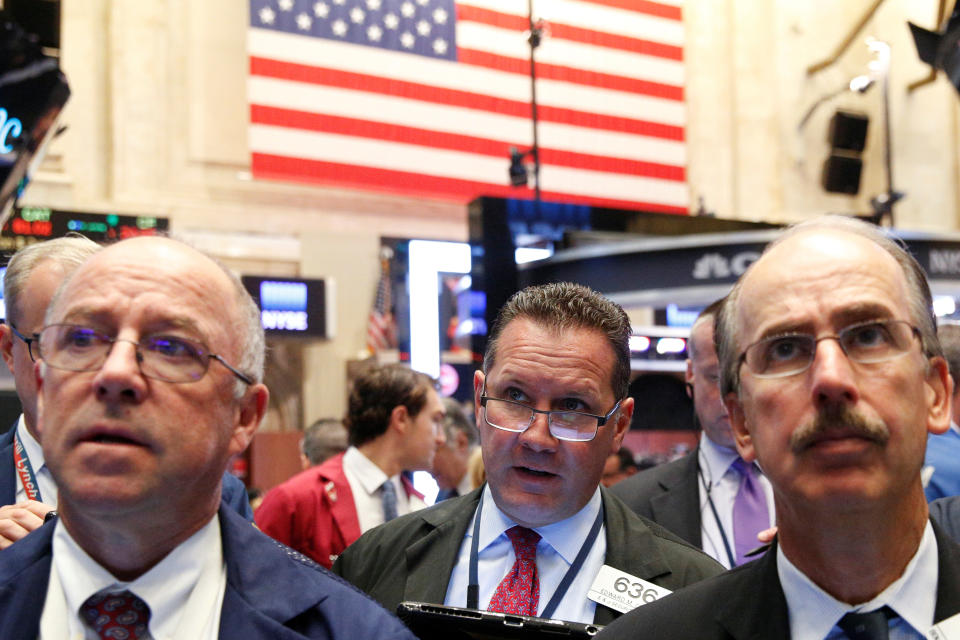 Traders work on the floor of the New York Stock Exchange (NYSE) in New York City, U.S., September 15, 2016.  REUTERS/Brendan McDermid