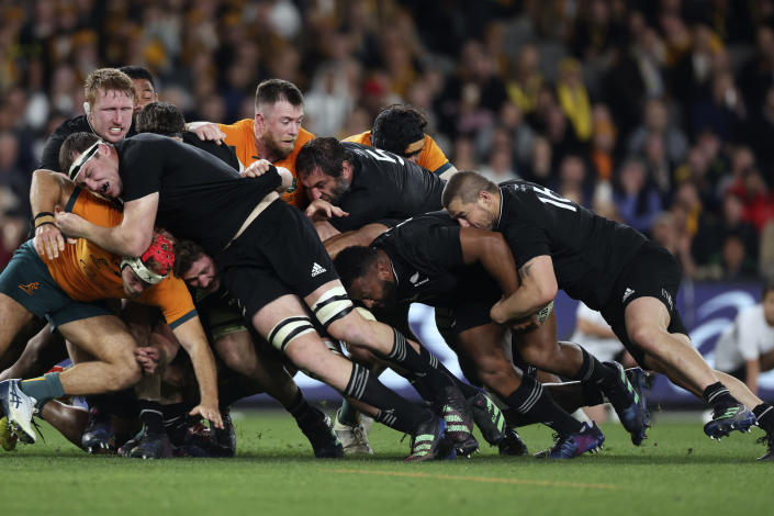 New Zealand All Black players overpower Australia's defense during a rolling maul in their Bledisloe Cup rugby test match in Melbourne, Australia, Thursday, Sept 15, 2022. (AP Photo/Asanka Brendon Ratnayake)