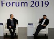 SoftBank Group founder and CEO Masayoshi Son and Alibaba founder and former Chairman Jack Ma attend the Tokyo Forum 2019 in Tokyo