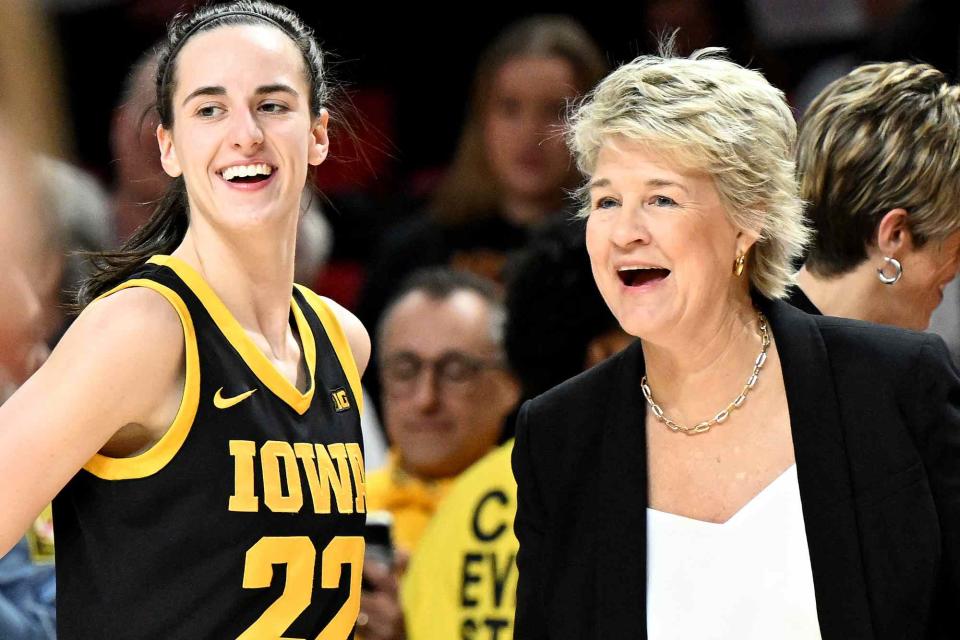 <p>G Fiume/Getty </p> Caitlin Clark and Lisa Bluder, coach of Iowa University women