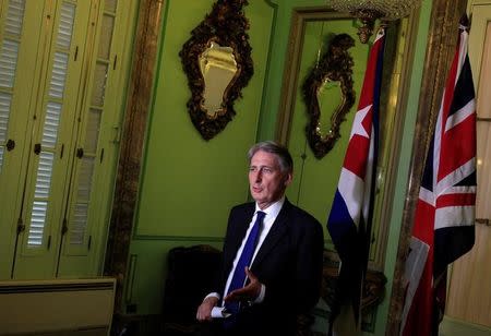 Britain's Foreign Secretary Philip Hammond talks to the media at the foreign ministry in Havana, Cuba, April 28, 2016. REUTERS/Enrique de la Osa