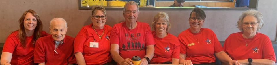 Two veterans and five Ellwood City McDonald's employees in red shirts for the restaurant's Red Short Day, held each Friday, in honor of local veterans. Pictured are, left to right, General Manager Kim Gallagher, Marine veteran John Biondi, Shelly Beauford, Army veteran Pete Maietta, Beth Bates, Pam Morabito and Karen Figurel.