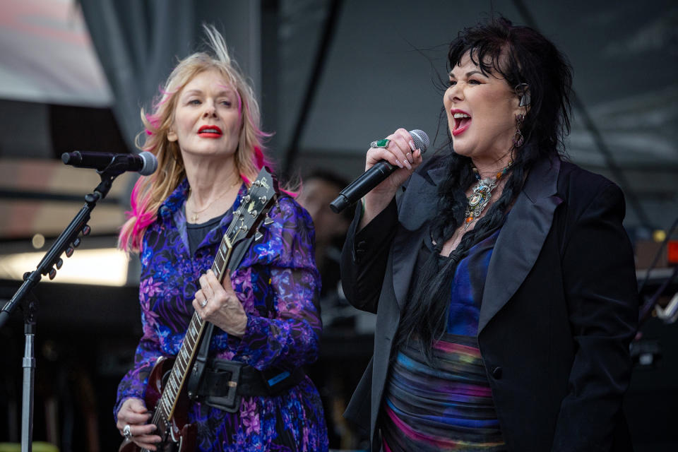 NEW ORLEANS, LOUISIANA - APRIL 28: (L-R) Nancy Wilson and Ann Wilson of Heart perform during day 4 of the New Orleans Jazz & Heritage Festival 2024 at Fair Grounds Race Course on April 28, 2024 in New Orleans, Louisiana. (Photo by Douglas Mason/WireImage)