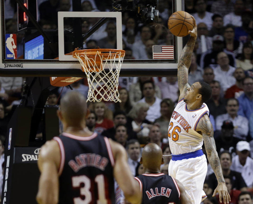 New York Knicks' Shannon Brown (26) prepares to dunk against the Miami Heat during the first half of an NBA basketball game in Miami, Thursday, Feb. 27, 2014. (AP Photo/Alan Diaz)