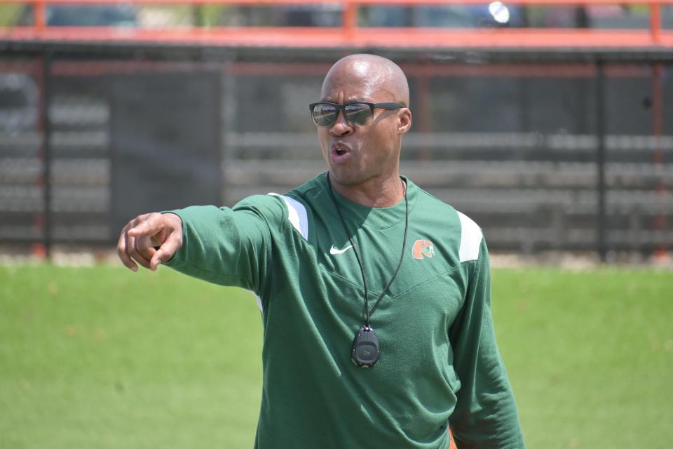 Florida A&M quarterbacks coach Henry Burris coaches campers at James Colzie III camp at Bragg Memorial Stadium in Tallahassee, Fla., Thursday, June 20, 2024.