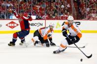 Apr 22, 2016; Washington, DC, USA; Philadelphia Flyers defenseman Shayne Gostisbehere (53) skates with the puck past Washington Capitals left wing Alex Ovechkin (8) in the first period in game five of the first round of the 2016 Stanley Cup Playoffs at Verizon Center. Mandatory Credit: Geoff Burke-USA TODAY Sports