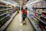 Royal aficionado Fumiko Shirataki, 78, shops for groceries at a supermarket near her home in Kawasaki, Japan, April 21, 2019. REUTERS/Issei Kato