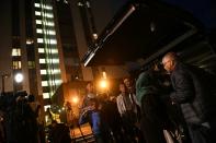 Residents load the boot of a car with belongings as they evacuate Taplow Tower residential block on the Chalcots Estate in north London on June 23, 2017 because of fire safety concerns