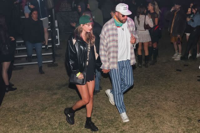 <p>Jennifer Johnson/Shutterstock for Neon Carnival </p> Taylor Swift (left) and Travis Kelce at Coachella 2024