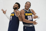 Denver Nuggets guard Jamal Murray, left, jokes with forward Aaron Gordon during the NBA basketball team's media day Monday, Sept. 26, 2022, in Denver. (AP Photo/David Zalubowski)