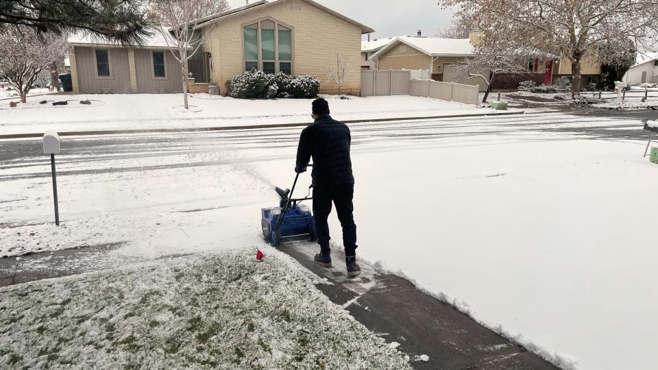 Snow Joe 48V Max Cordless Snow Blower being tested in writer's home