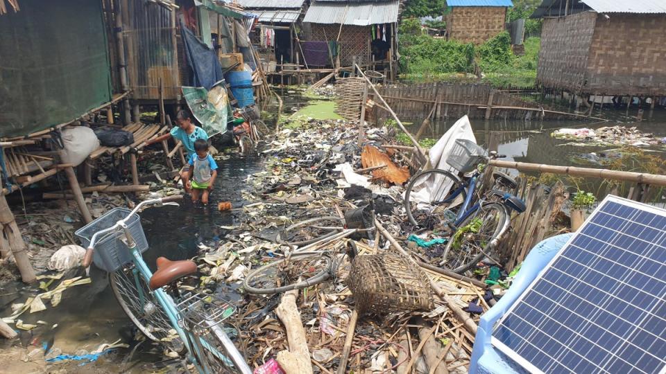 Foreign plastic waste is dumped throughout Ward 27, an informal community in Yangon township, where residents are fearful of speaking out due to repercussions from Myanmar’s military junta (Supplied to The Independent)