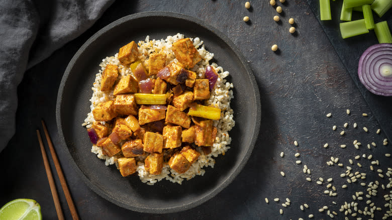 Stir-fried tofu over rice 