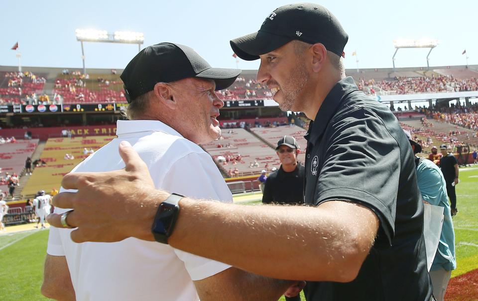 Iowa State coach Matt Campbell greets Northern Iowa coach Mark Farley on Saturday at Jack Trice Stadium.
