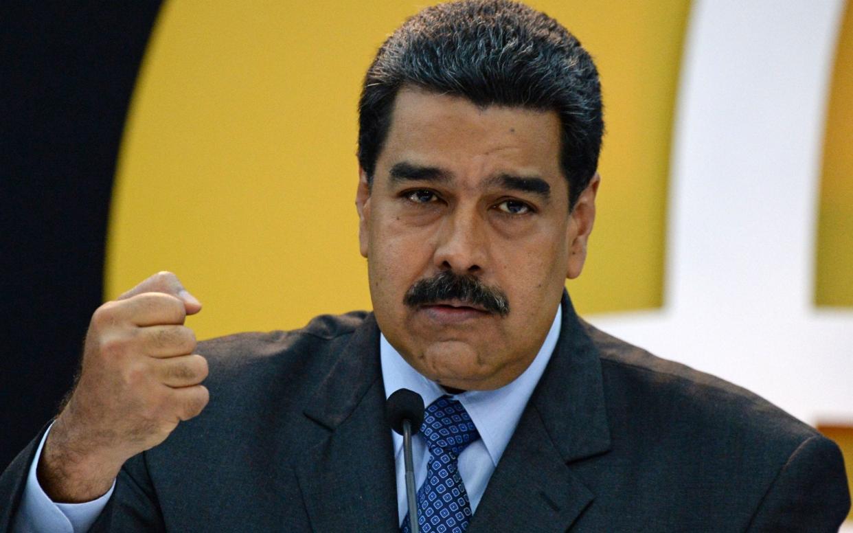 Nicolas Maduro remains in power in Venezuela despite plots to unseat him and opposition from America - AFP