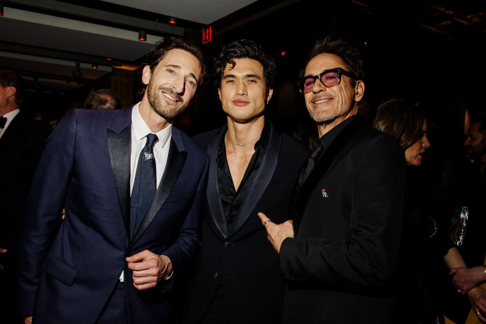 Adrien Brody, Charles Melton and Robert Downey Jr.