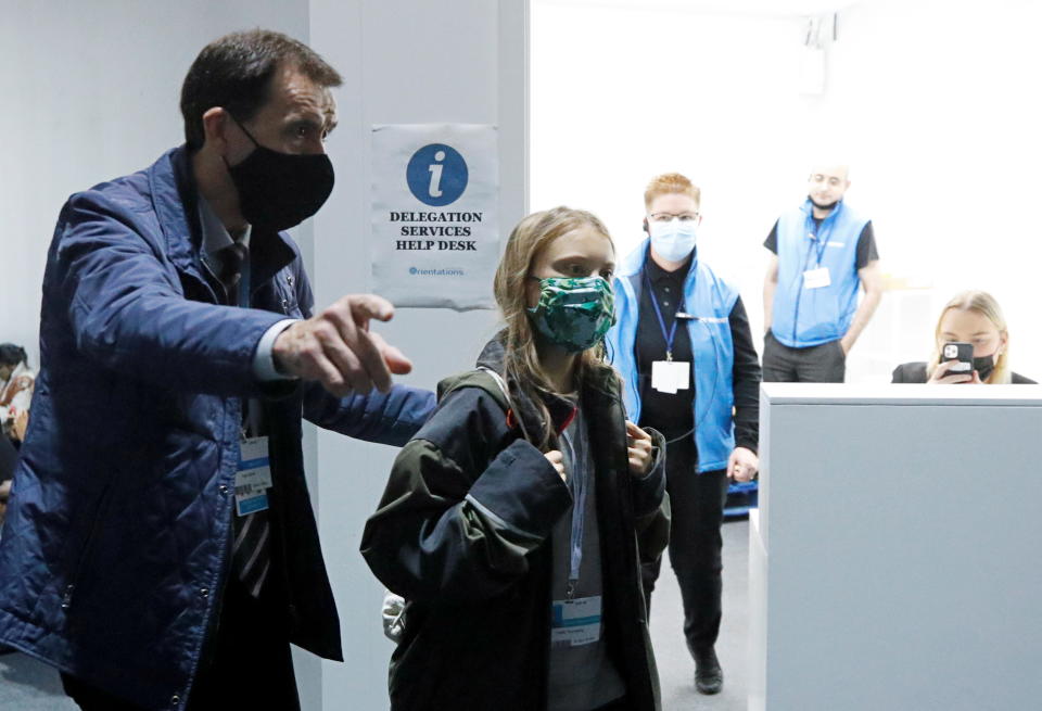 Swedish activist Greta Thunberg leaves after attending a meeting at the U.N. Climate Change Conference in Glasgow.