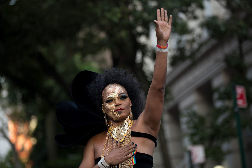 Anthony LaMont waves to the crowd in New York City