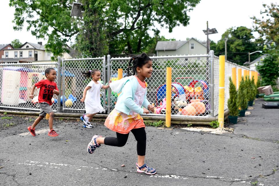 Future Generation Early Learning Center has remained open during the Covid-19 pandemic to care for children of essential workers. A preschool class plays outside the daycare in Bloomfield on Wednesday, June 3, 2020.