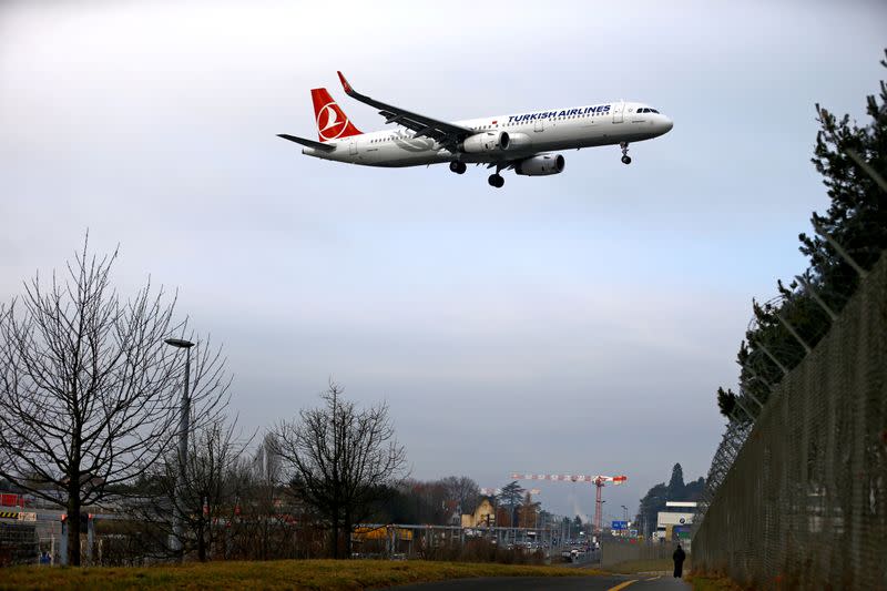 FILE PHOTO: An airplane from Turkish Airlines prepares to land at Cointrin airport in Geneva