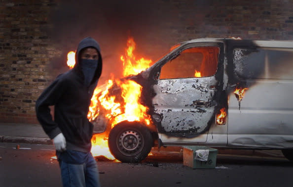 Between August 6 and 10, riots broke out across England. The world watched live footage on global news channels as gangs looted and set businesses and buildings ablaze. The violence started after a protest march on August 6, reacting to the fatal shooting of Mark Duggan by Metropolitan Police two days earlier, in the London district of Tottenham. The violence spread across the nation, lasting a week. (Photo by Peter Macdiarmid/Getty Images)