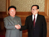 FILE - In this file photo released by Chinese official news agency Xinhua on June 1, 2000, Chinese then President Jiang Zemin, right, meets with North Korean then leader Kim Jong Il in Beijing, China. Chinese state TV said Wednesday, Nov. 30, 2022, that Jiang has died at age 96. (Xinhua via AP, File)