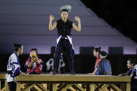 <p>Dancers perform during the opening ceremony in the Olympic Stadium at the 2020 Summer Olympics. (AP Photo/Natacha Pisarenko)</p> 