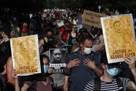 Demonstrators gather at the Minnesota governor's mansion Monday, June 1, 2020, in St. Paul, Minn. Protests continued following the death of George Floyd, who died after being restrained by Minneapolis police officers on Memorial Day. (AP Photo/John Minchillo)