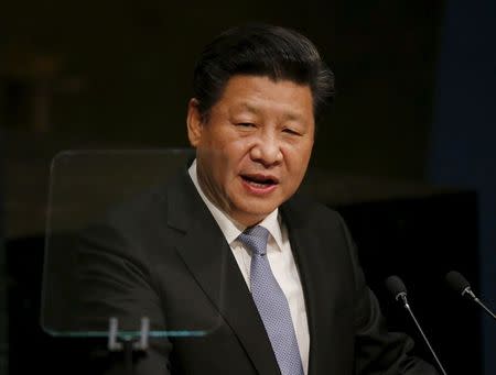 President Xi Jinping of China addresses attendees during the 70th session of the United Nations General Assembly at the U.N. Headquarters in New York, in this September 28, 2015 file photo. REUTERS/Carlo Allegri/Files