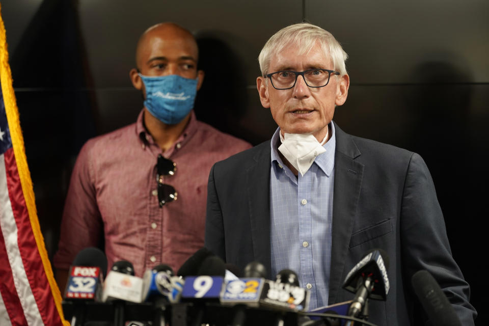 FILE - In this Aug. 27, 2020, file photo, Wisconsin Gov. Tony Evers speaks during a news conference in Kenosha, Wis. Advocates for redistricting reform hope informal citizens commissions created in a number of states can draw public attention to partisan gerrymandering and its consequences. While the commissions have no official role, their supporters hope to use them to pressure the real map-makers to temper their political inclinations. Faced with legislatures controlled by opposing political parties, Evers formed citizens commissions to make recommendations to lawmakers responsible for redistricting. (AP Photo/Morry Gash, File)