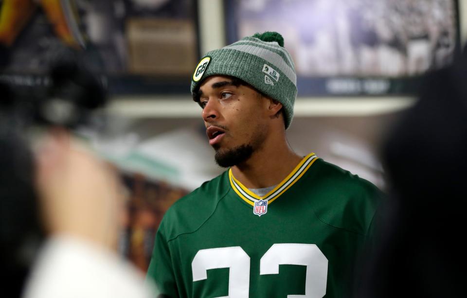 Green Bay Packers cornerback Jaire Alexander talks with media at Lambeau Field on Oct. 18, 2022, about the organization's involvement with Toys for Tots, which is in its 75th season.