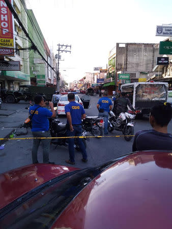 People gather after an explosion outside a mall in Cotabato City, Philippines, December 31, 2018 in this picture obtained from social media. ARIANNE MAMARIL/via REUTERS