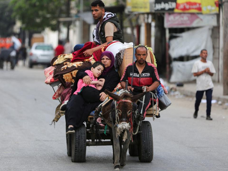 Palestinians flee Rafah due to an Israeli military operation, in Rafah, in the southern Gaza Strip. (REUTERS)