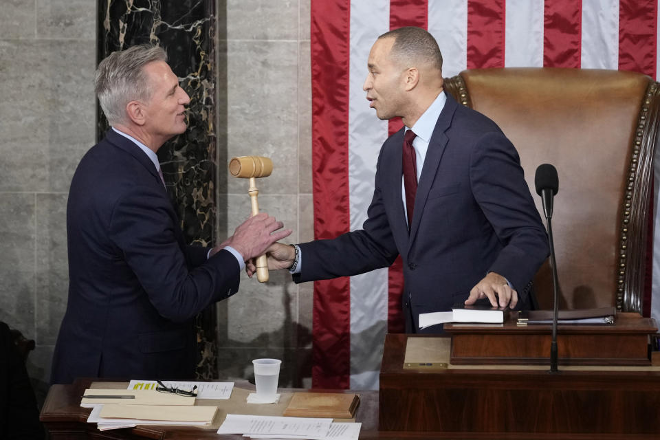 Incoming House Speaker Kevin McCarthy of Calif., receives the gavel from House Minority Leader Hakeem Jeffries of N.Y., on the House floor at the U.S. Capitol in Washington, early Saturday, Jan. 7, 2023. (AP Photo/Andrew Harnik)