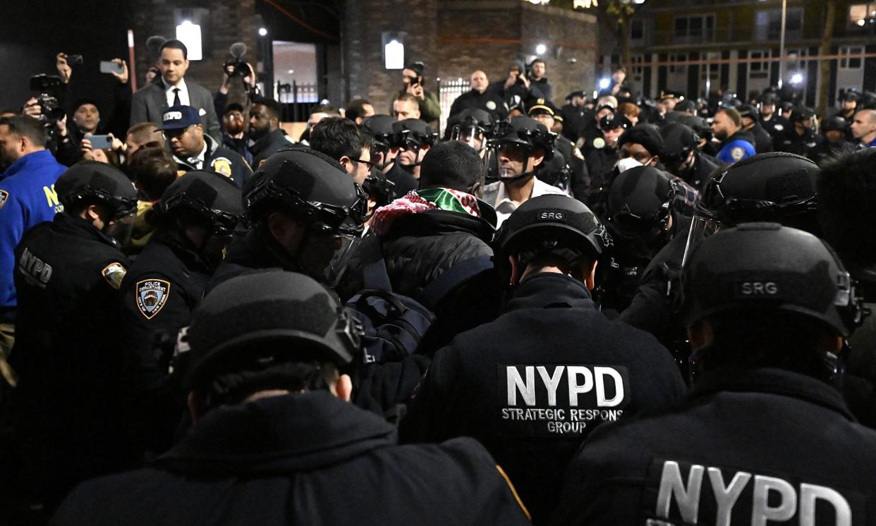 <span>Police disrupt protests to arrest students at New York University.</span><span>Photograph: Anadolu/Getty Images</span>