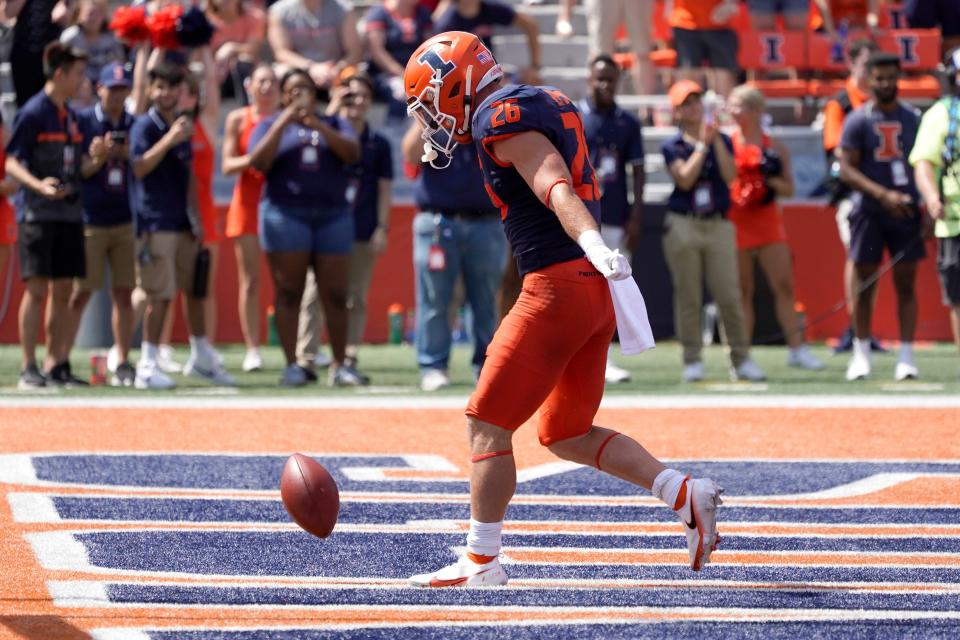 Illinois running back Mike Epstein celebrates his touchdown during the first half against Nebraska.