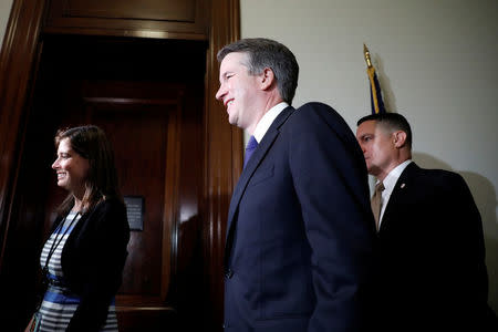 FILE PHOTO: Judge Brett Kavanaugh, President Donald Trump's nominee to be associate justice of the Supreme Court, arrives to meet with Sen. Rand Paul (R-KY) on Capitol Hill in Washington, U.S., July 24, 2018. REUTERS/Aaron P. Bernstein