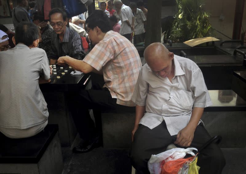 Elderly men in Chinatown. (AP file photo)