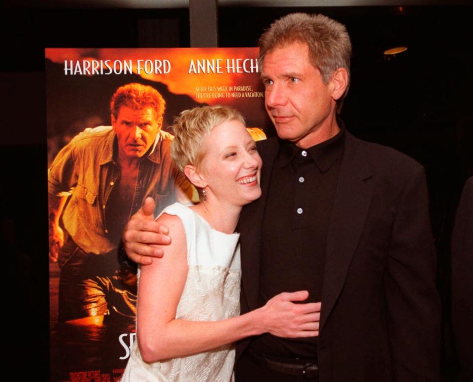 Anne Heche and Harrison Ford embrace at the premiere of their film, Six Days, Seven Nights in 1998 (Chris Pizzello/AP) (AP)