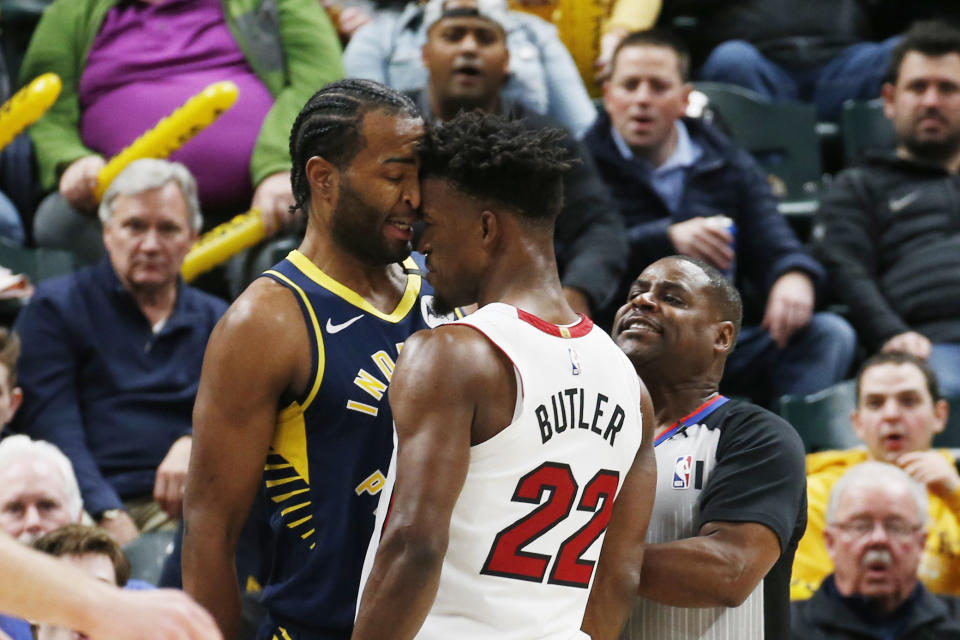 Jimmy Butler and T.J. Warren gave fans their money's worth in the midst of a blowout. (Brian Spurlock/Reuters)