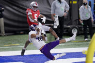 FILE - In this Dec. 19, 2020, file photo, Northwestern defensive back Brandon Joseph (16) intercepts a pass intended for Ohio State wide receiver Garrett Wilson (5) in the end zone during the first half of the Big Ten championship NCAA college football game in Indianapolis. Joseph was selected to The Associated Press Preseason All-America first team defense, Monday Aug. 23, 2021.(AP Photo/AJ Mast, File)