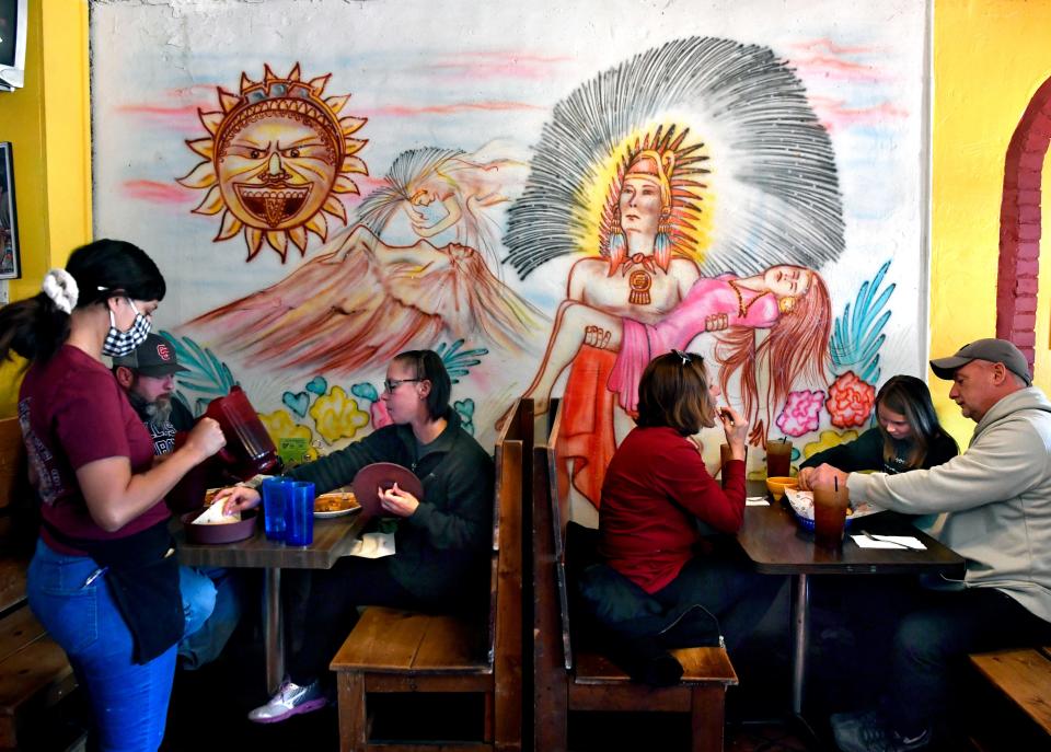 Customers dine during lunch at El Fenix Cafe Thursday Dec. 24, 2020. It was the final day of business for the long-time Abilene eatery.